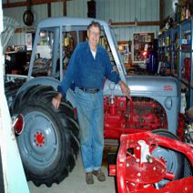 Our friend, Warren. He LOVES tractors!